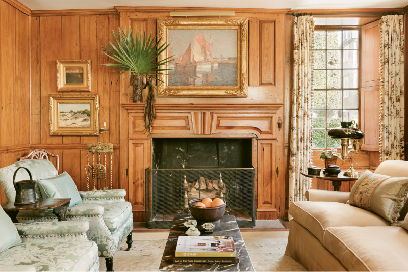 At one point, the original cypress paneling in this room was hidden under more than 20 layers of paint; upon moving in, the Seegers hired artisans to continue the previous owner’s restoration of the wood.