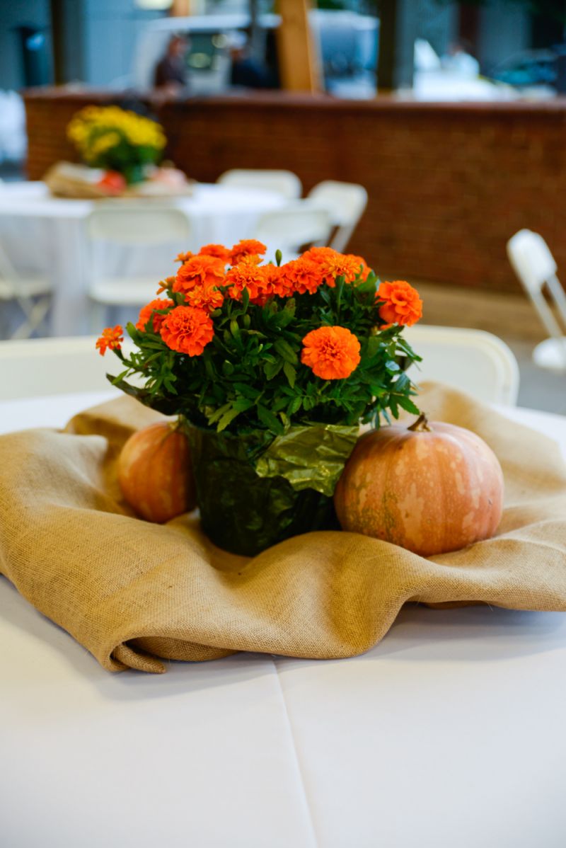 Festive, fall flowers courtesy of Abide-A-While added a decorative touch to the tables.