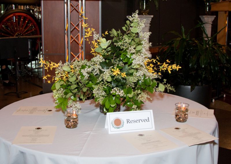 Table decor at the gala featured fresh spring flowers.