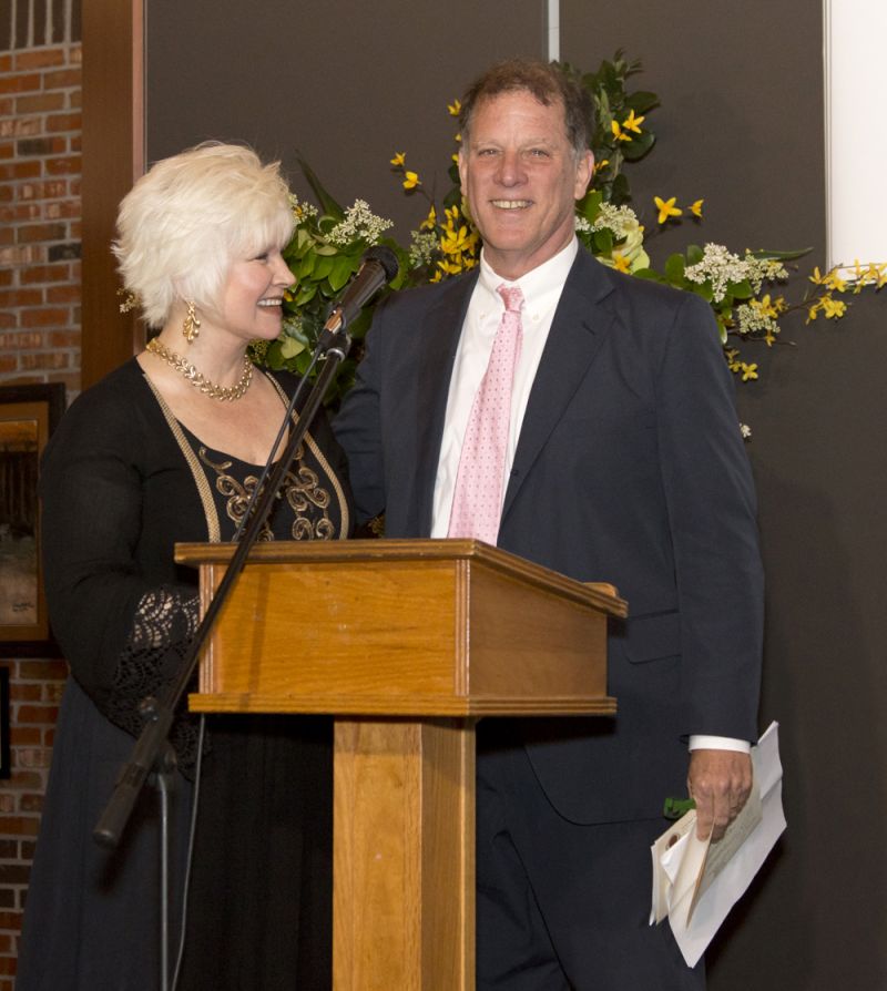 Mary Gould presented Charles Fox with the list of donors.
