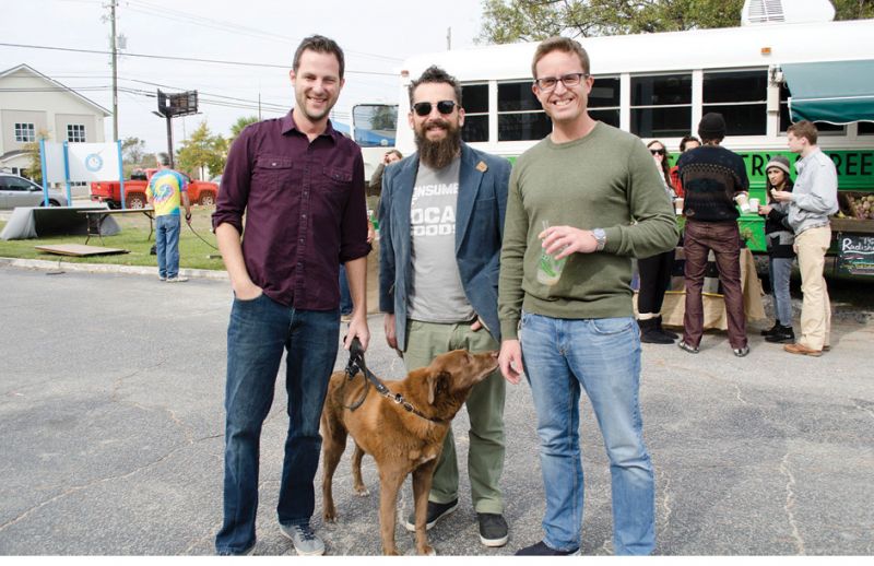 David Tisdale, Larry Downey,  and Kyle McAllister with pooch Putney