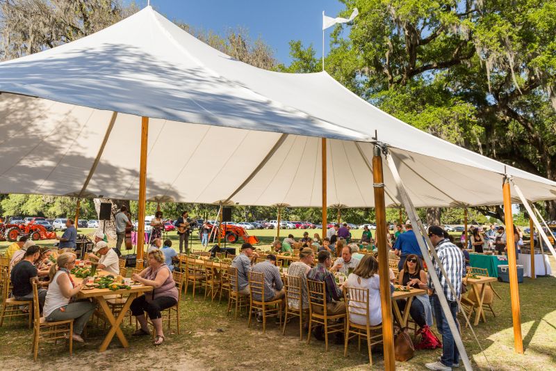 Tables in the outdoor tents were filled with colorful local produce.