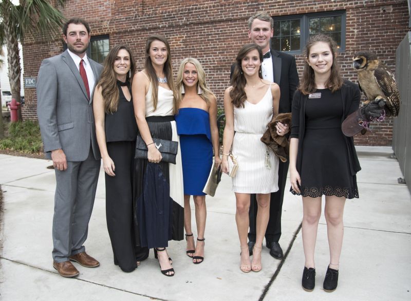 James Morris, Tara Merino, Carson Lunceford, Taylor Fulcher, Cole Armstrong, Mary McGill Armstrong, and Hayley Eynon with an Asian brown wood owl