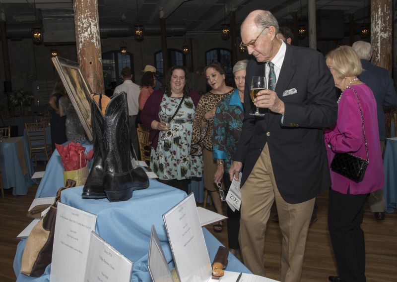 Guests browsed silent auction items.