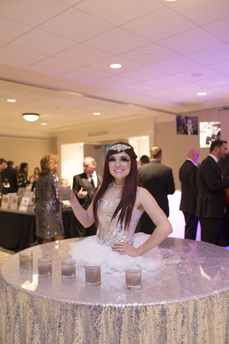Guests were greeted by an Elevate performer serving drinks.