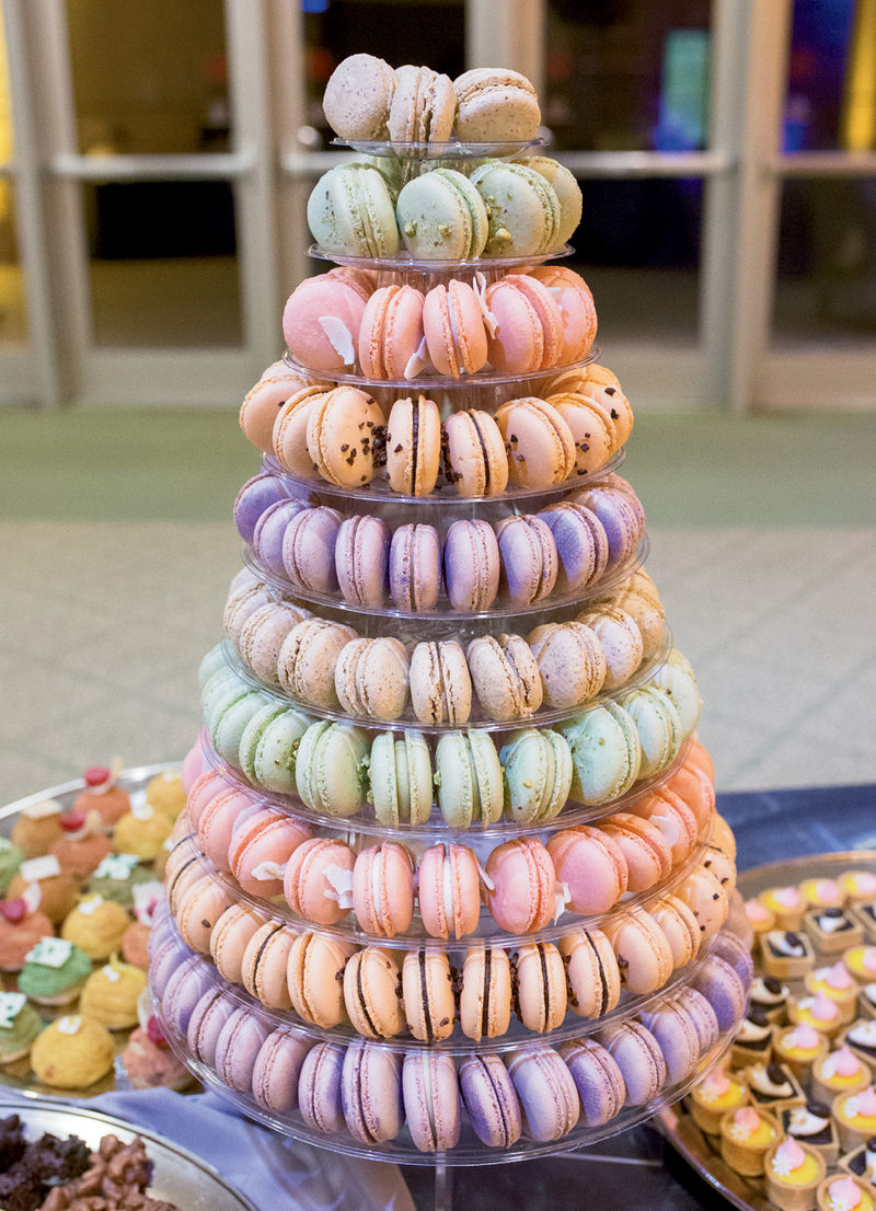 A towering display of macaroons on the dessert spread