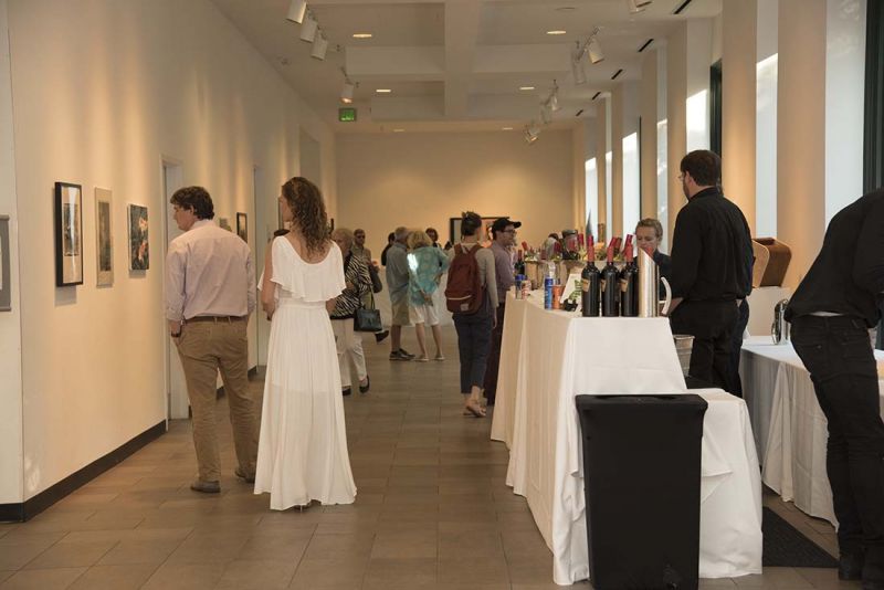 Guests mingled and headed to the food and drink stations set up outside of the gallery.