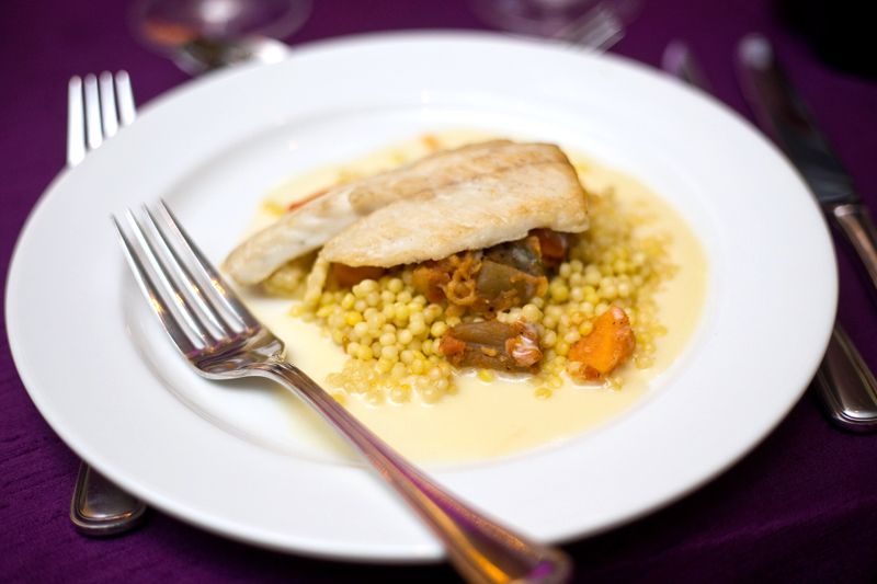 The second course featured pan-seared brazino, a tangine of vegetables, Israeli couscous, and aromatic broth.