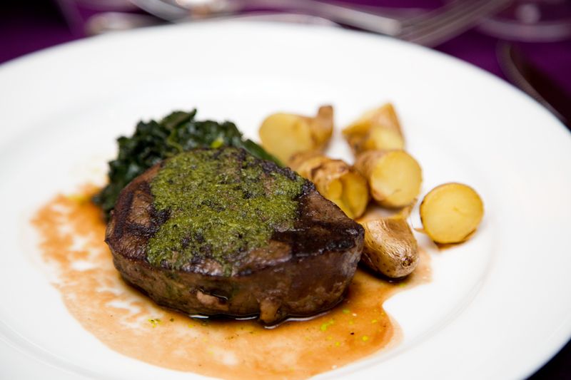 The third course featured grilled filet of beef in a red wine demi-glace and chimchuri sauces with salt-cured fingerling potatoes and winter greens.