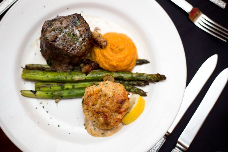 Herb rubbed petite filet &amp; lump crab cake with grilled organic asparagus and sweet potato puree