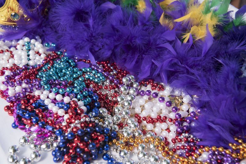 Traditional Mardi Gras beads were handed out before the crawl.
