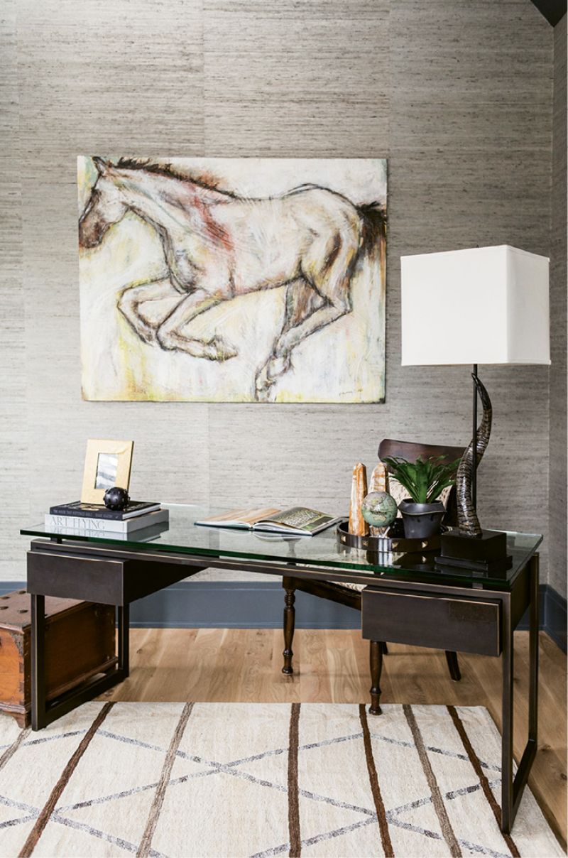 ...with Phillip Jeffries grasscloth-covered walls and desk from Restoration Hardware.