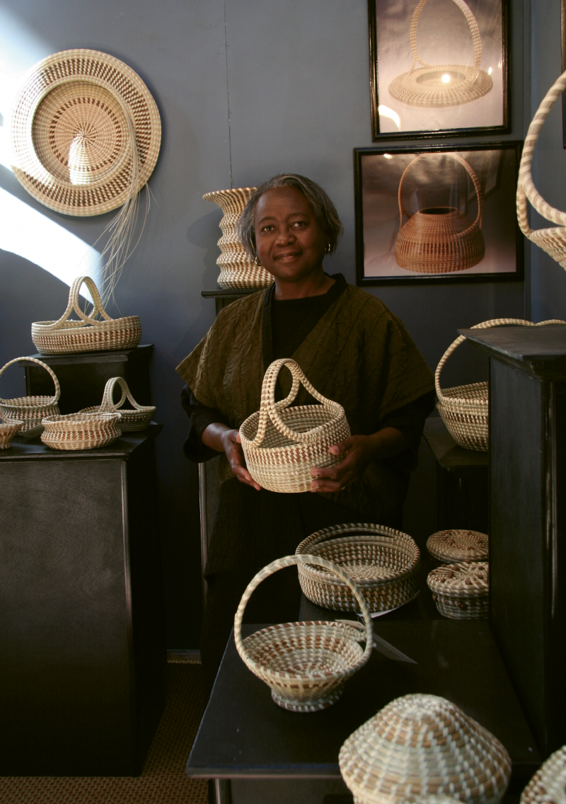 Artful Precision: Jackson’s baskets are true to traditional forms, but she weaves innovative artistry into their execution. Meticulous with her choice of materials and precise in her stitches, Jackson’s work demonstrates restraint and discipline, with hints of whimsy. Jackson is pictured here at the Smithsonian Craft Show in 2006.