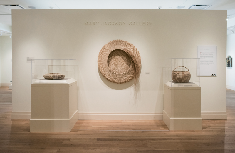 Modern Master: When the Gibbes reopened after an extensive renovation in 2016, the modern and contemporary galleries were named in Jackson’s honor. Her pieces are part of the museum’s permanent collection, including (center) Never Again and (right) Cobra with Handle (circa 1980; sweetgrass, bullrush, and palmetto; 15 x 16 inches), as well as (left) Diploma (sweetgrass, bulrush, and palmetto) which is on loan from a private collection.