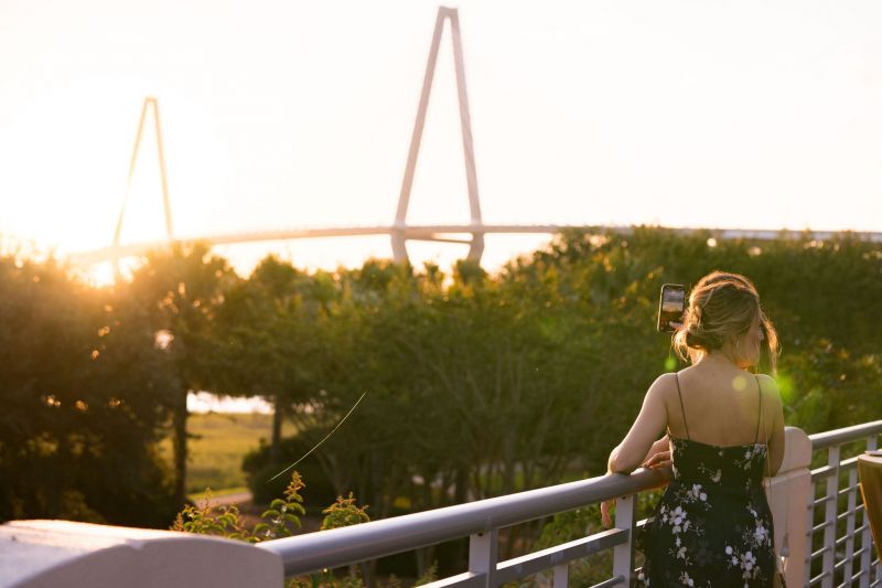 Guests gazed out upon the Ravenel Bridge from the courtyard.