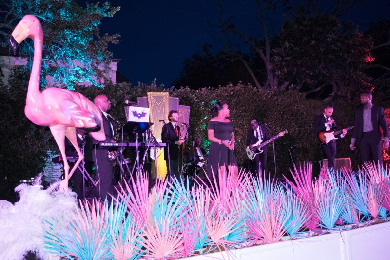 The live music stage was a bright centerpiece for the Miami-inspired theme.