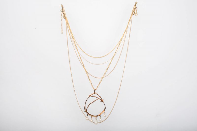 Roka 18K yellow gold and pearl five strand necklace, $158 at Out of Hand