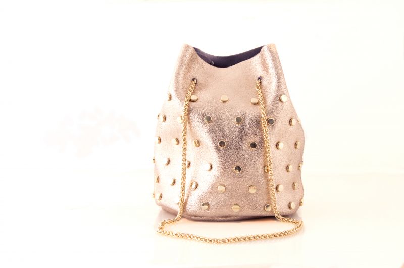 Suede bucket bag in rose gold, $78 at V2V