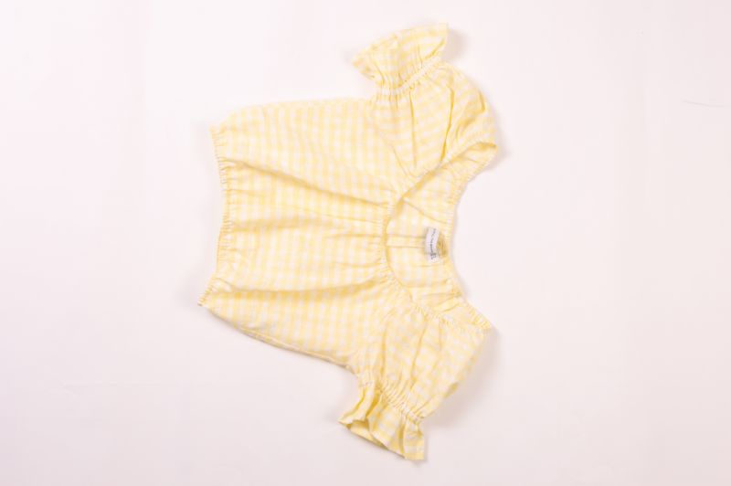 Faithfull the Brand “Biassa” top in “hello yellow,” $127 at Beckett Boutique