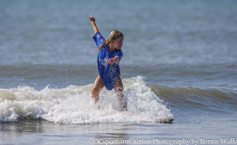 Chapman Lannes catches a wave during the Folly Beach Wahine Classic. (Photograph by Bernie Walls)