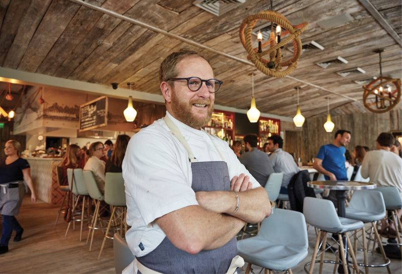 Under Pressure: Chef Jacques Larson (pictured here at The Obstinate Daughter on Sullivan’s Island) readily admits the last two years have been the hardest of his three decades in F&amp;B. “Restaurant work isn’t the easiest profession when there isn’t a global pandemic, but a host of new problems as a result of COVID has squeezed the life out of many restaurants. For many the stress and demoralization of the process has proven to be insurmountable.”