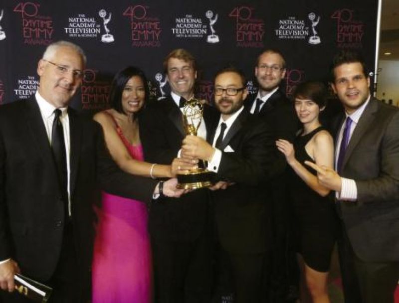 And the Emmy Goes To: The Born to Explore team (from left to right) Andy Ames, Mercedes Velgot, Richard Wiese, John Barnhardt, Greg Harriott, Laura Cunningham, and Jay Katz at the Daytime Emmys in June; The trophy was bestowed upon Barnhardt and B-camera operator Harriott for Outstanding Achievement in Single Camera Photography.