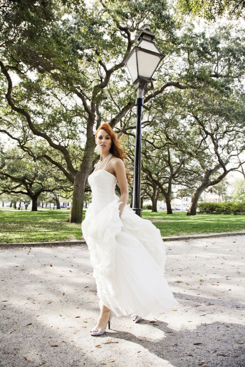 A WALK IN THE PARK: Martina Liana tiered silk organza gown from Gown Boutique of Charleston. Five-strand pearl necklace from Croghan’s Jewel Box. Nina’s d’Orsay heels from LulaKate.