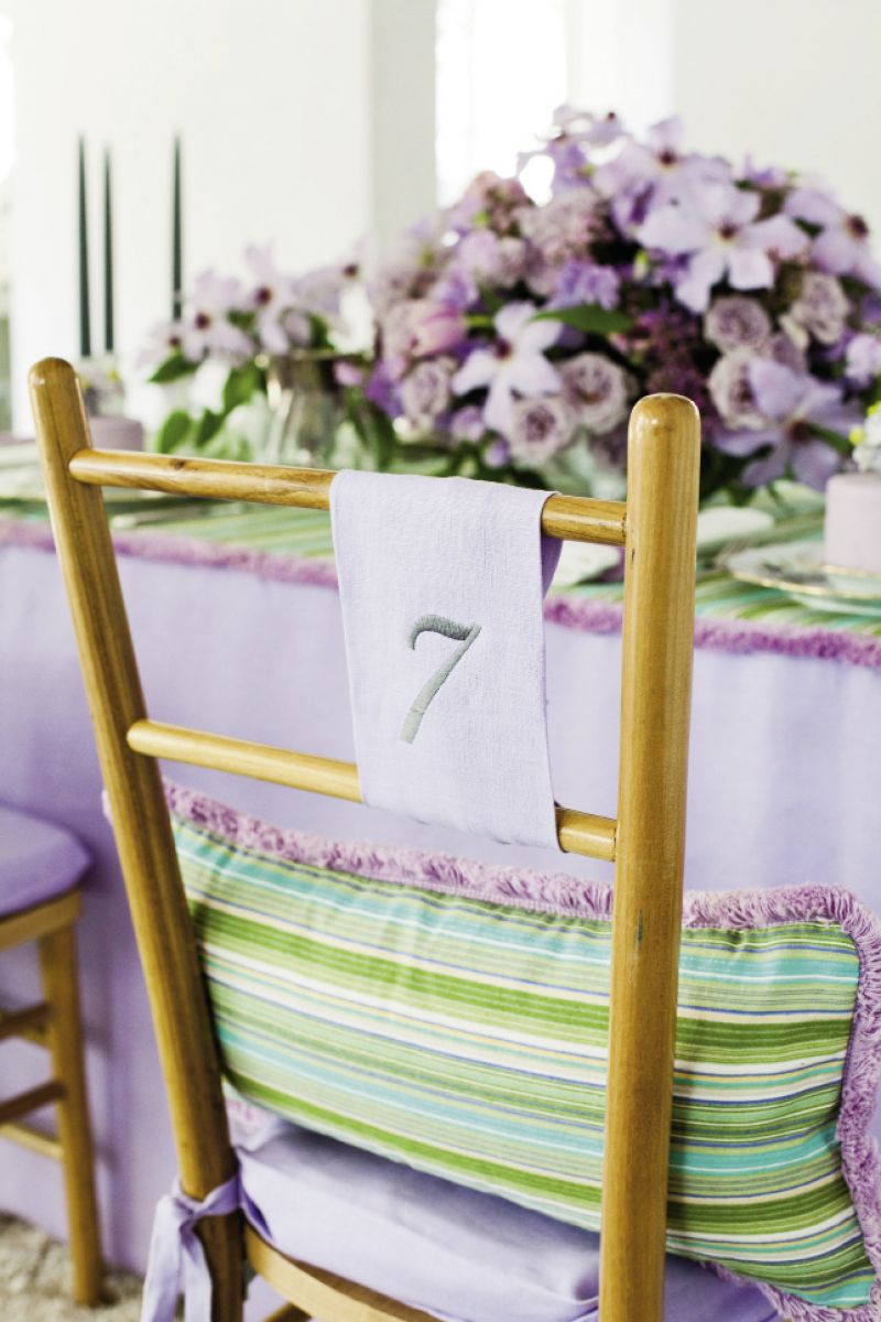 NUMBERS GAME: remnants were used for the embroidered table number, which was simply tied onto the back of a Lane chair (designed by Tara).