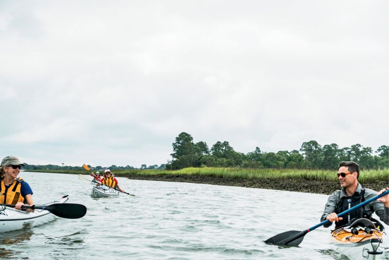 Kayak Farm guide-owner Eric Gibbons leads a group of paddlers through Fripp Inlet.