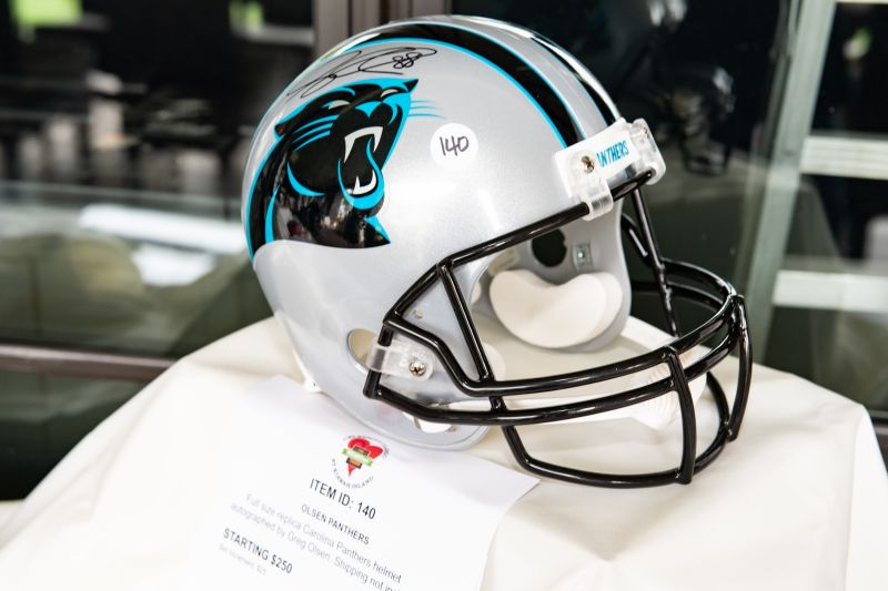 An autographed Panthers football helmet up for grabs during the auction