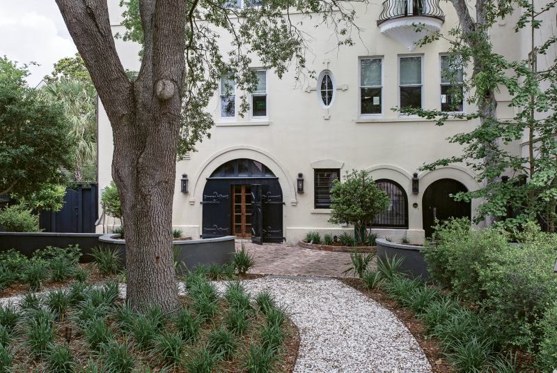 Go with the Flow: Maryland-based couple Rick and Kristy Schultz “bought a garage”—i.e. a three-story carriage house in sight of the Battery—as a second home, enlisting Richard Marks Restorations and Kristin Peake Interiors to transform the formerly drab dependency. Just as renovations were wrapping up, Tropical Storm Irma washed a foot and a half of surge into the ground floor (left), which spurred on storm adaptations. They revised the exterior hardscape with an eye toward drainage and changed up interior materials, furnishings, and electrical wiring to suit.