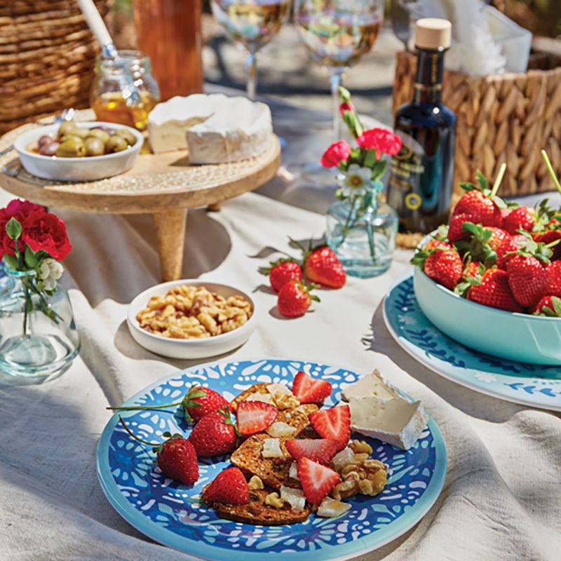 Strawberry Picnic: 1.Raincoast Crisps or a baguette, 2.Brie or Grana Padano cheese, 3.Walnuts, 4.Honey or balsamic glaze, 5.Strawberries -- Take a crisp, or baguette slice, add a small layer of Brie or Grana Padano, and top with a walnut and strawberry slice. Add a drizzle of honey or balsamic  vinegar glaze. Serve with a chilled rosé.