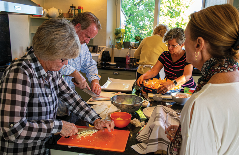 Working alongside Chef Bob to create the evening&#039;s gourmet meal