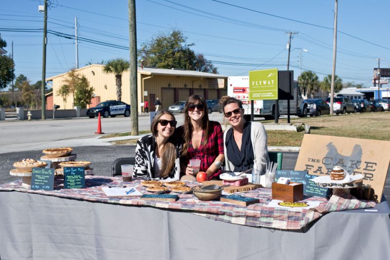 Janelle Riolo and Bethany Ellis helped Amy Robinette (center) sell her famous pies.