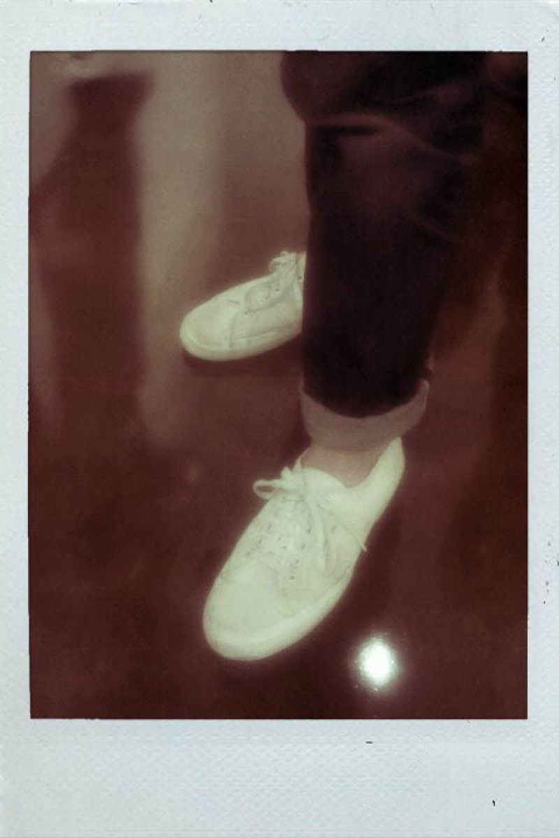 Brett&#039;s wears crisp white sneaks with cuffed denim.