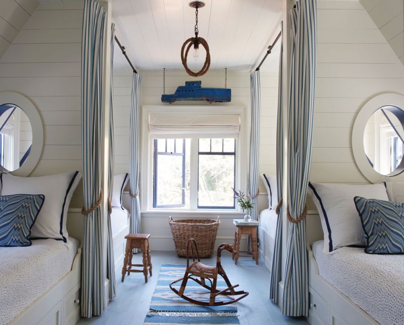 Personal Space: The additional bedrooms each have a distinct personality. The charming bunk room, which can sleep eight on its full beds, is a playful space, its shiplapped bunks, portholes, and pretty Brunschwig &amp; Fils pillows creating a nautical vibe.