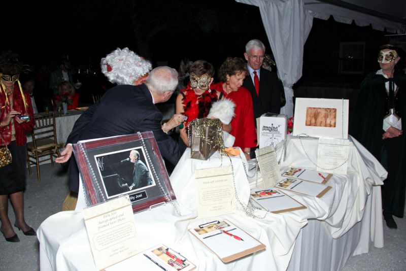 Guests bid on silent auction items throughout the evening