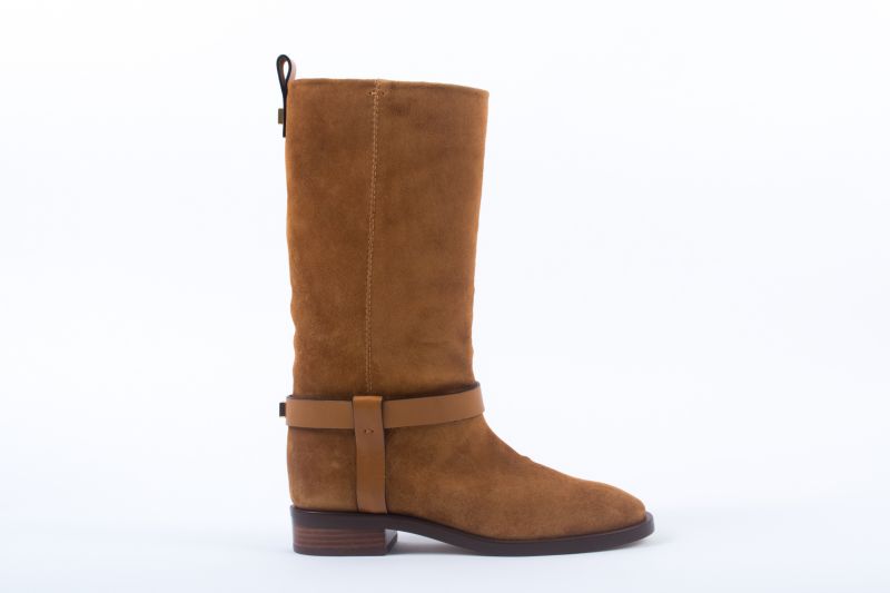 Stuart Weitzman “The Casey” boot in bridle ansonia, $698 at Shoes on King