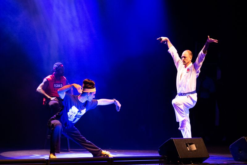 Hosts Ryan Becknell and Geoff Richardson, perform a kung-fu-themed opening act entitled “Lips of Fury”