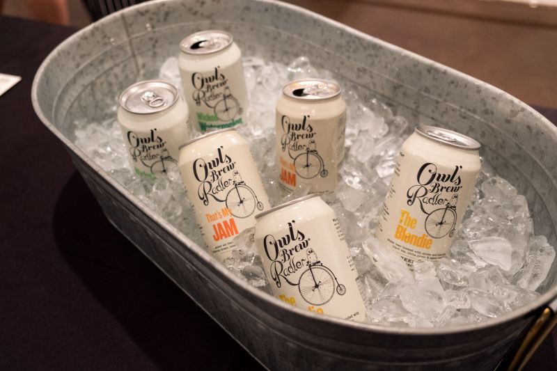 Fitting the theme of the exhibit, Owl&#039;s Brew Radler was the evening’s drink of choice.