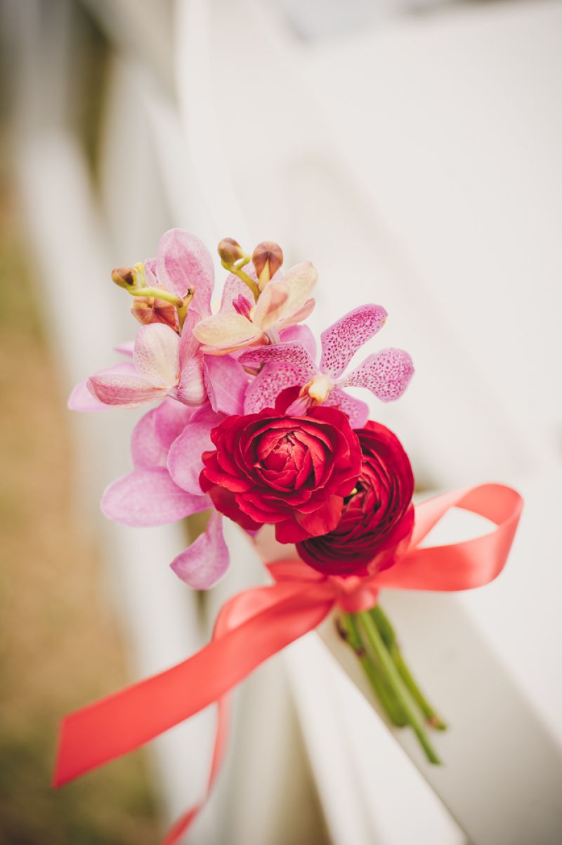 ORGANIC COMPOUND: Branch Design Studio fashioned a bridal bouquet of crimson ranunculus