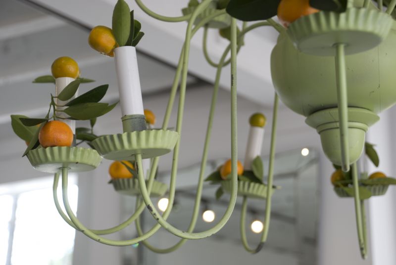 This super-sweet chandelier from Ooh! Events sported some killer electric candle lights, but for this look, I wanted to play with the calamondin oranges we had gotten from Joan MacDonald’s garden.
