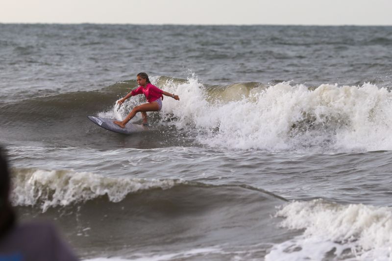 Story Martinez from Virginia took first place in the menehune (little girls) shortboard division.