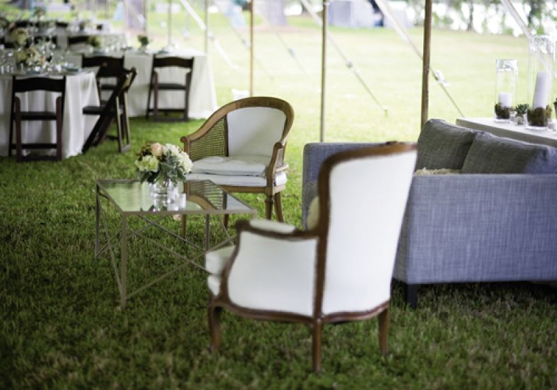 TAKE A SEAT: With silvery blue and ivory lounge furniture, Sarah Katherine says “the comforts of a beautiful home were brought to the outdoor venue.”