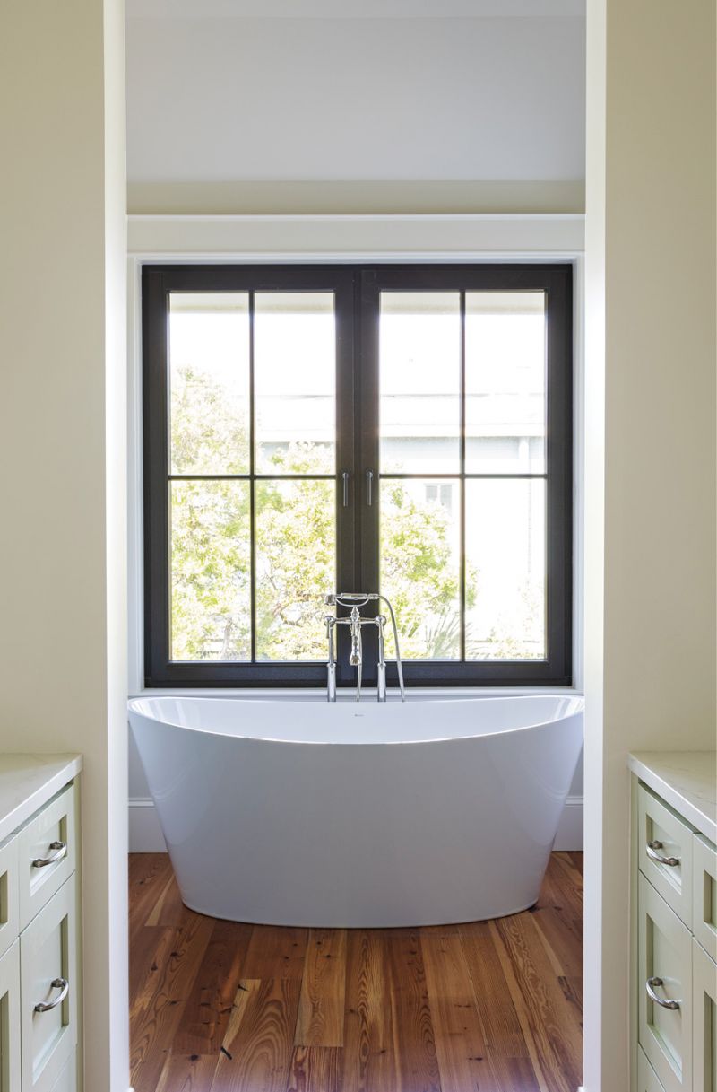 The en-suite bath features a glorious soaking tub.