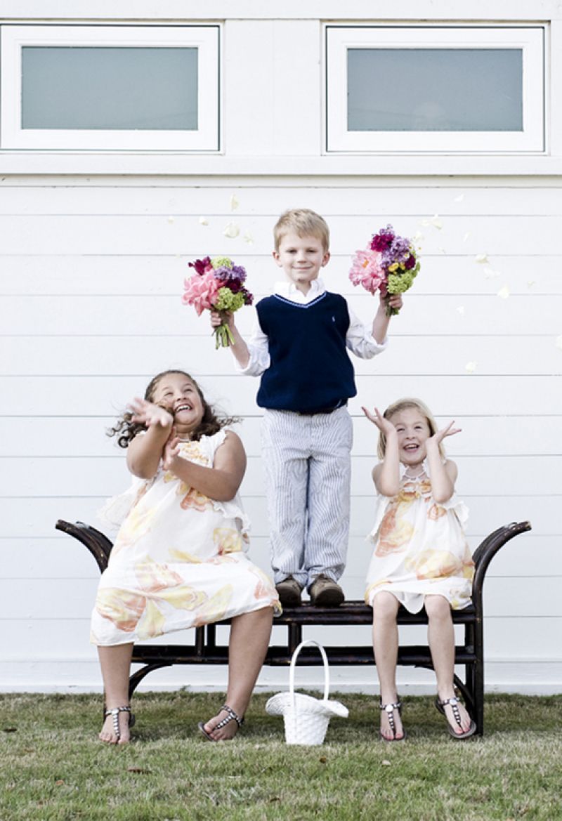 PRETTY AS A PETAL: Ring bearer Aaron and flower girls Jade and Iris, all cousins of Lee’s, made happy with wildflower bouquets.