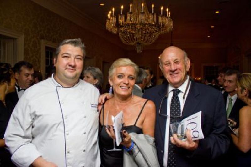 One of the night&#039;s big auction items was dinner prepared by the Harbour Club&#039;s Chef Travis Overholt, seen here with Gerline Sievert and Gene Vlanton.