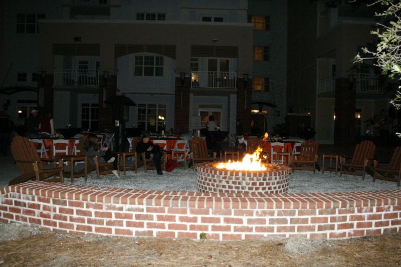 A fire pit warmed guests on the chilly night
