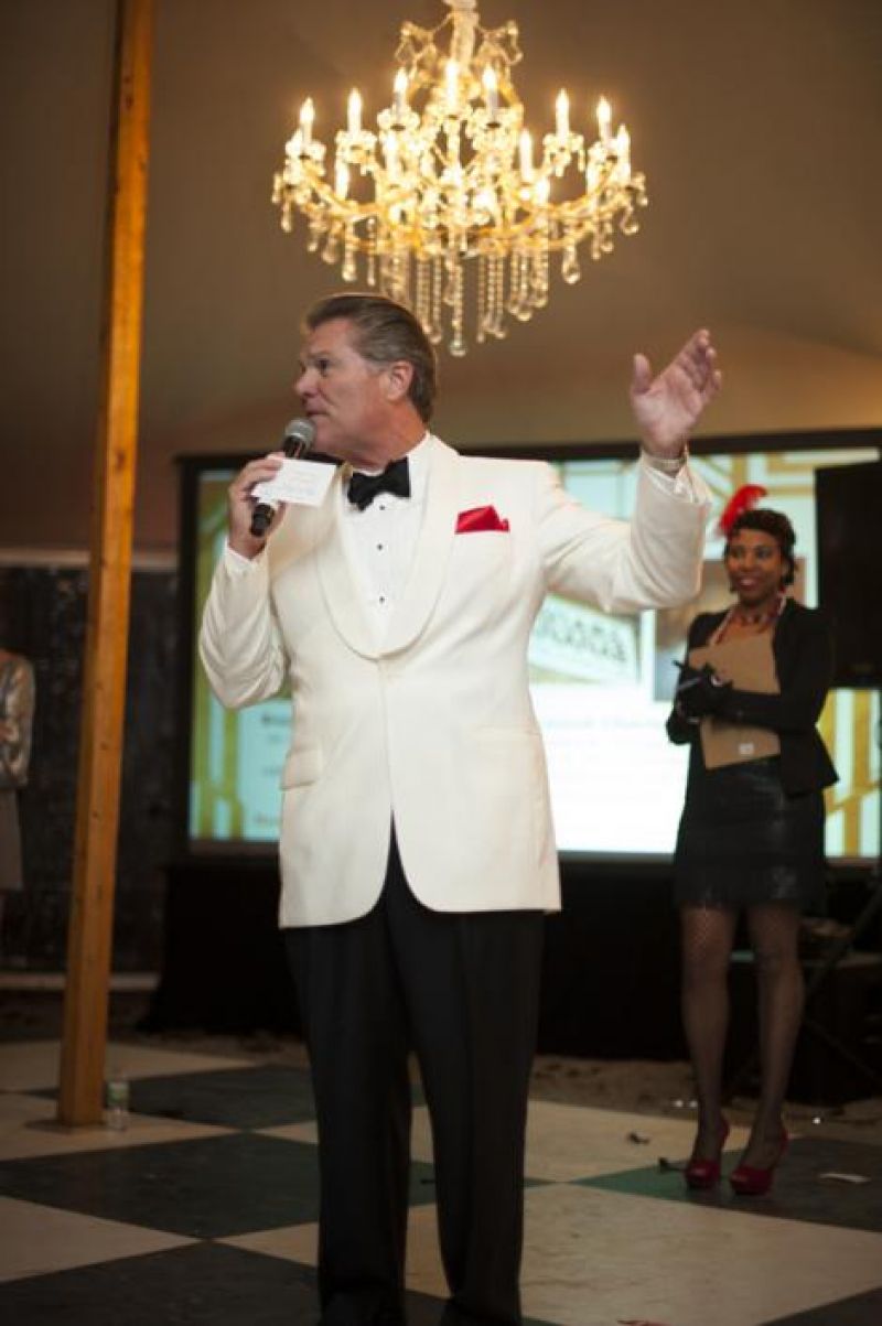 Auctioneer Extraordinaire (and local meteorologist) Tom Crawford