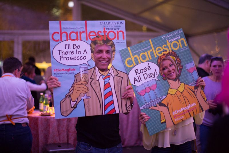 Guests snag a photo with Charleston magazine&#039;s pop art props.